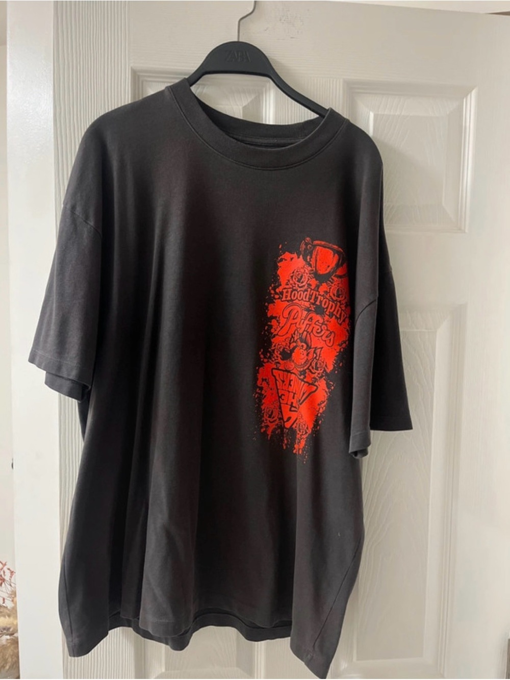 Black Short-Sleeve Tee with Red Chest Graphic